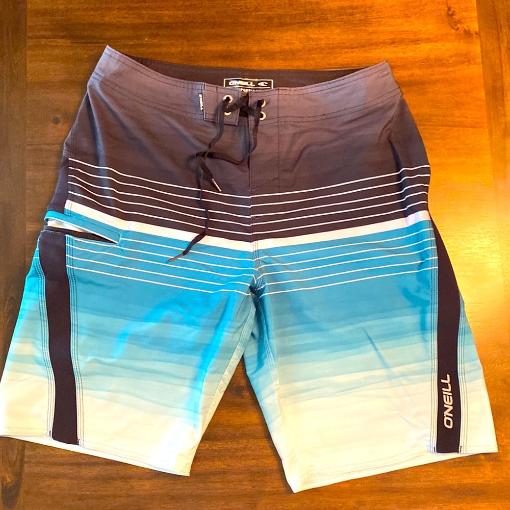 Swim trunks, O’Neil, size 30, lace close, no liner, 1 side pocket